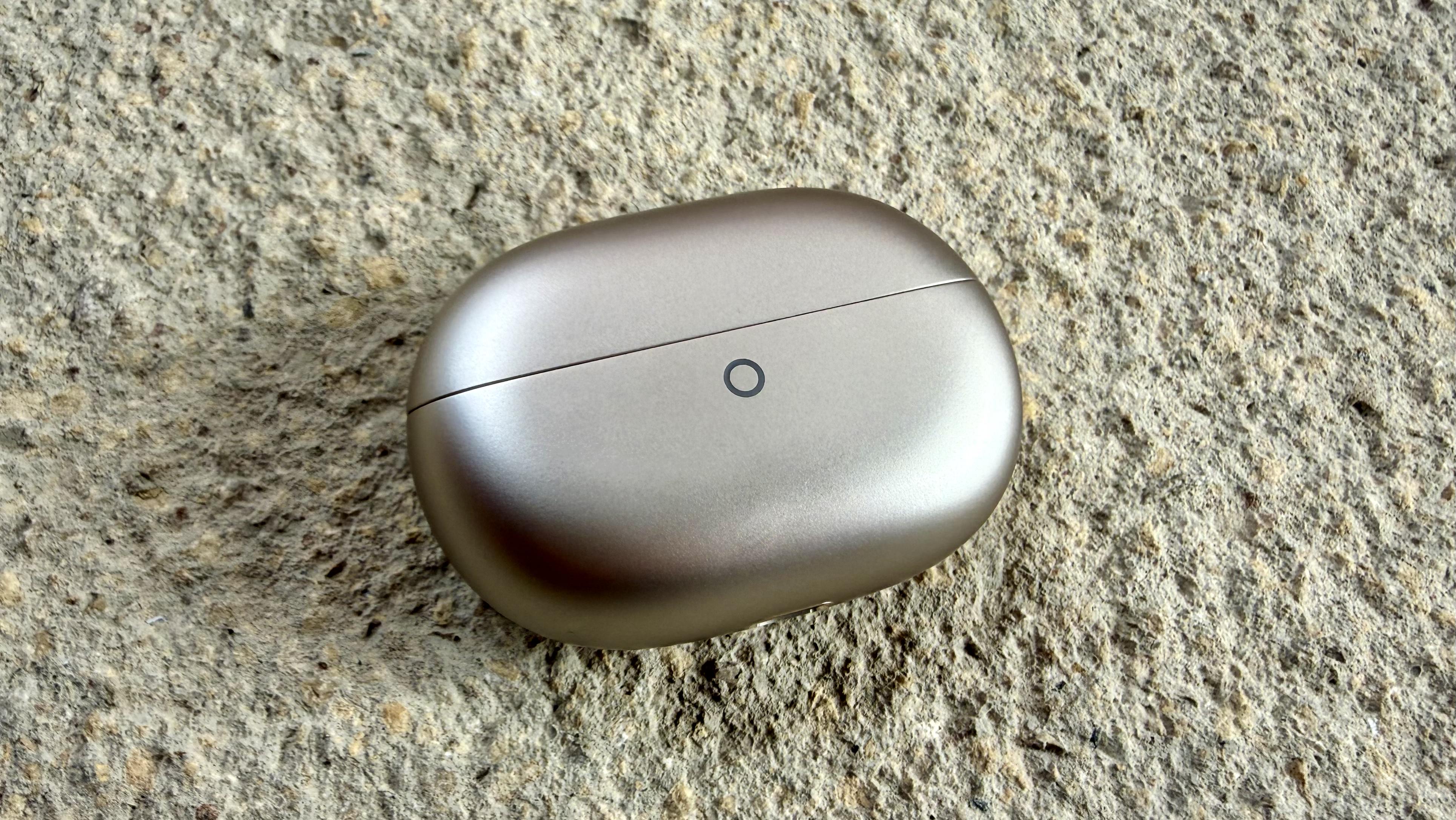 The Huawei FreeBuds Pro 5 charging case, shown closed on a stone surface