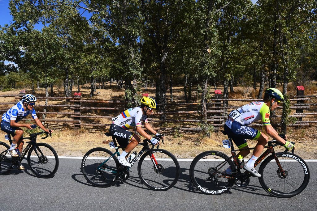 NAVACERRADA SPAIN SEPTEMBER 10 LR Richard Carapaz of Ecuador and Team INEOS Grenadiers Polka Dot Mountain Jersey Sergio Andres Higuita Garcia of Colombia and Team Bora Hansgrohe and Louis Meintjes of South Africa and Team Intermarch Wanty Gobert Matriaux compete in the breakaway during the 77th Tour of Spain 2022 Stage 20 a 181km stage from Moralzarzal to Puerto de Navacerrada 1851m LaVuelta22 WorldTour on September 10 2022 in Puerto de Navacerrada Spain Photo by Tim de WaeleGetty Images