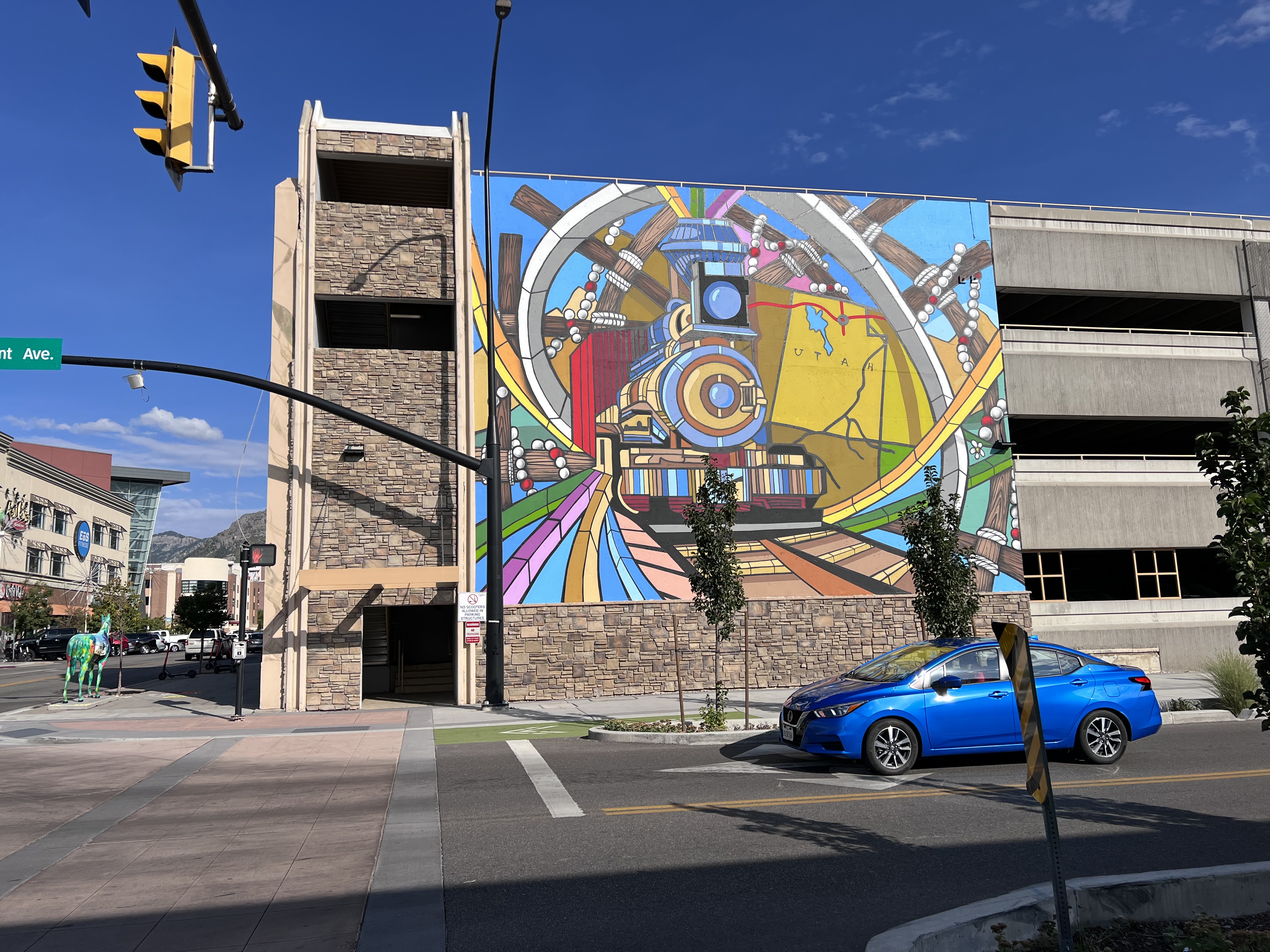 photo of a mural and car in the cool photographic style