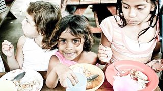 image of children eating in the developing world