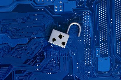 A security flaw depicted by a padlock with bullet holes on a circuit board