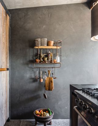 a kitchen with a textured limewash wall