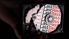 LastPass logo and branding reflected on the internal discs of a hard drive.