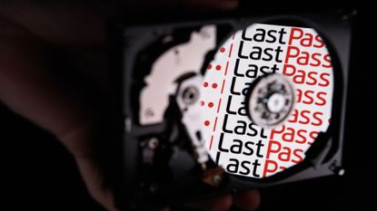 LastPass logo and branding reflected on the internal discs of a hard drive.