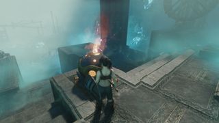 Enshrouded Fell Thunderbrute Head - a player is standing next to a Flame orb in the blue-coloured fogginess of the Shroud