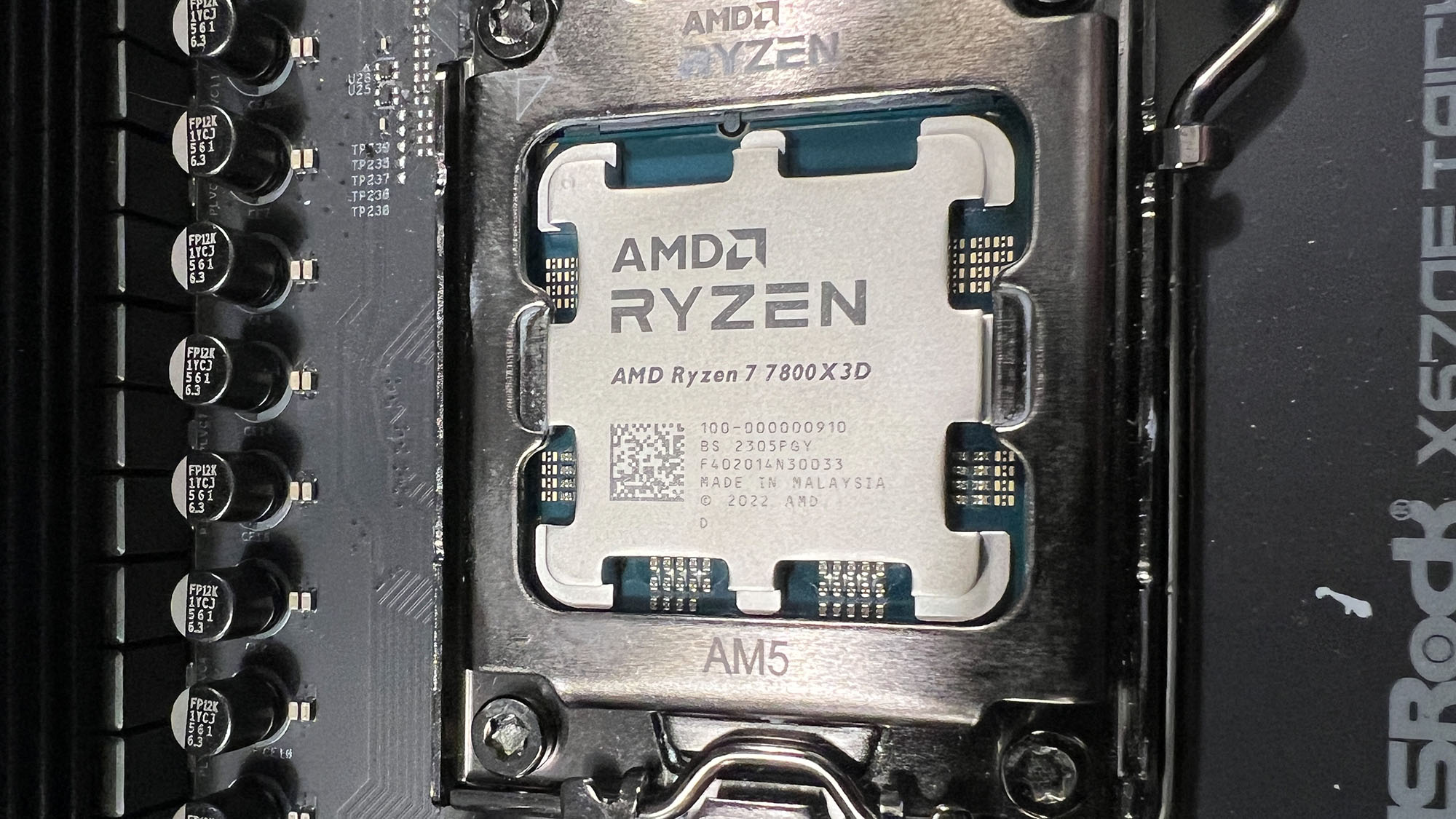 An AMD Ryzen 7 7800X3D slotted into a motherboard