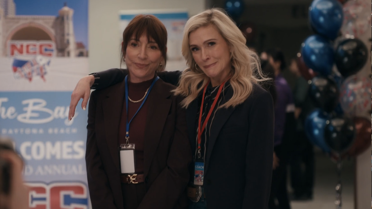 Courteney reluctantly posing with Marg for a photo in Stumble Season 1x13