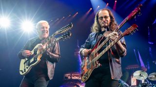 Alex Lifeson (L) and Geddy Lee of Rush perform in concert during the "Rush: Fifty Something" tour at Dickies Arena on July 11, 2026 in Fort Worth, Texas