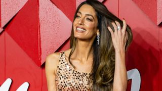 amal clooney with shiny long hair