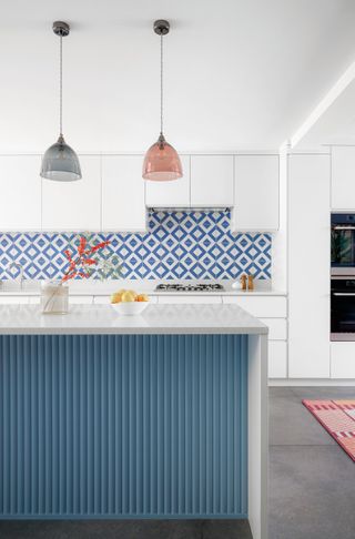 Blue ribbed kitchen island in modern London house