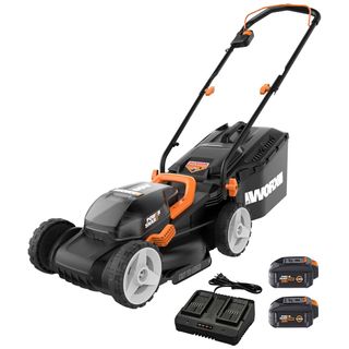 A Worx WG779 lawn mower with its batteries and charger