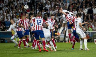 Sergio Ramos rises to head home a late equaliser for Real Madrid against Atletico Madrid in the 2014 Champions League final in Lisbon.