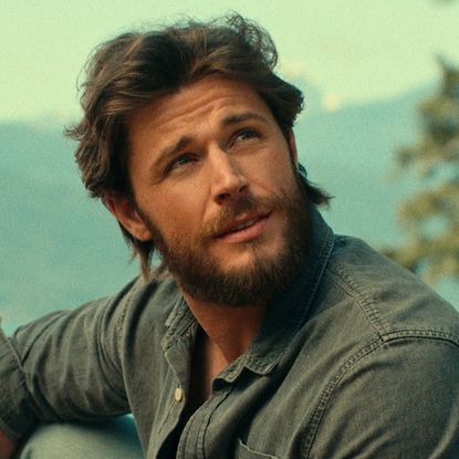 callum kerr as young everett at a picnic on top of a mountain in virgin river season 6