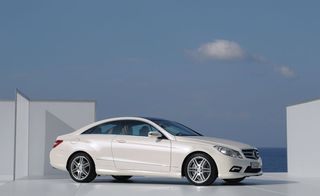 The E500 features the trademark rising shoulder line, a shallow curve that gives the whole car a tipped-forward stance