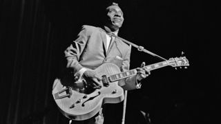 T-Bone Walker (1910-1975) with a Gibson ES-5 guitar during a blues show at the Apollo Theater in Harlem neighbourhood of Manhattan, New York City, New York, circa 1965.