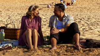 Christine and Terry looking relaxed and happy on the beach together