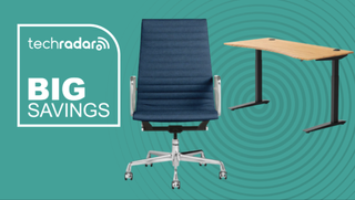 Herman Miller standing desk and office chair on a green background next to a TechRadar badge reading 'Big Savings'