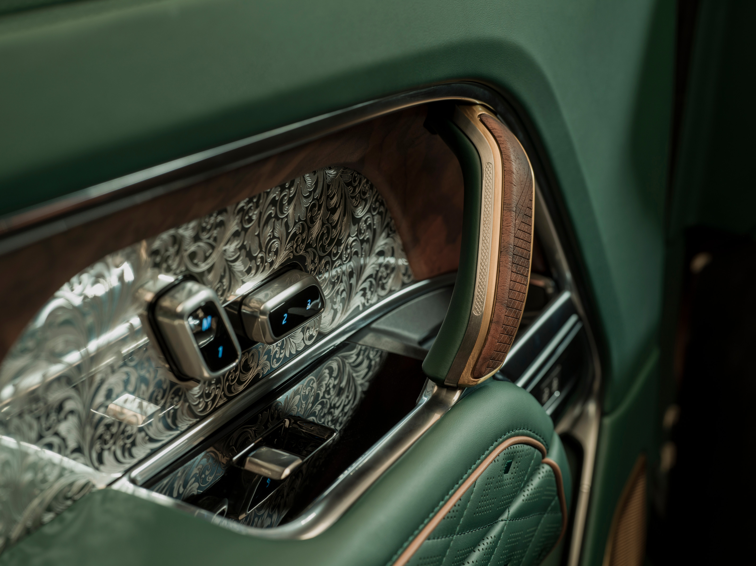 Detail of the engraved door trims that mirror the details on H&amp;amp;H's guns