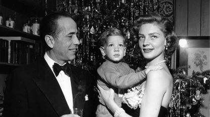 lauren bacall and humphrey bogart with their christmas tree