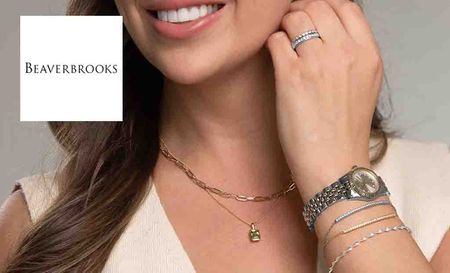 beaverbrooks logo top left with a close up shot of a womans wrist 