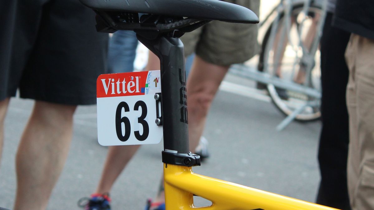 Number 63 was number 1 on stage 1, and thus his tally of Tour de France stage victories is noted in gold and red