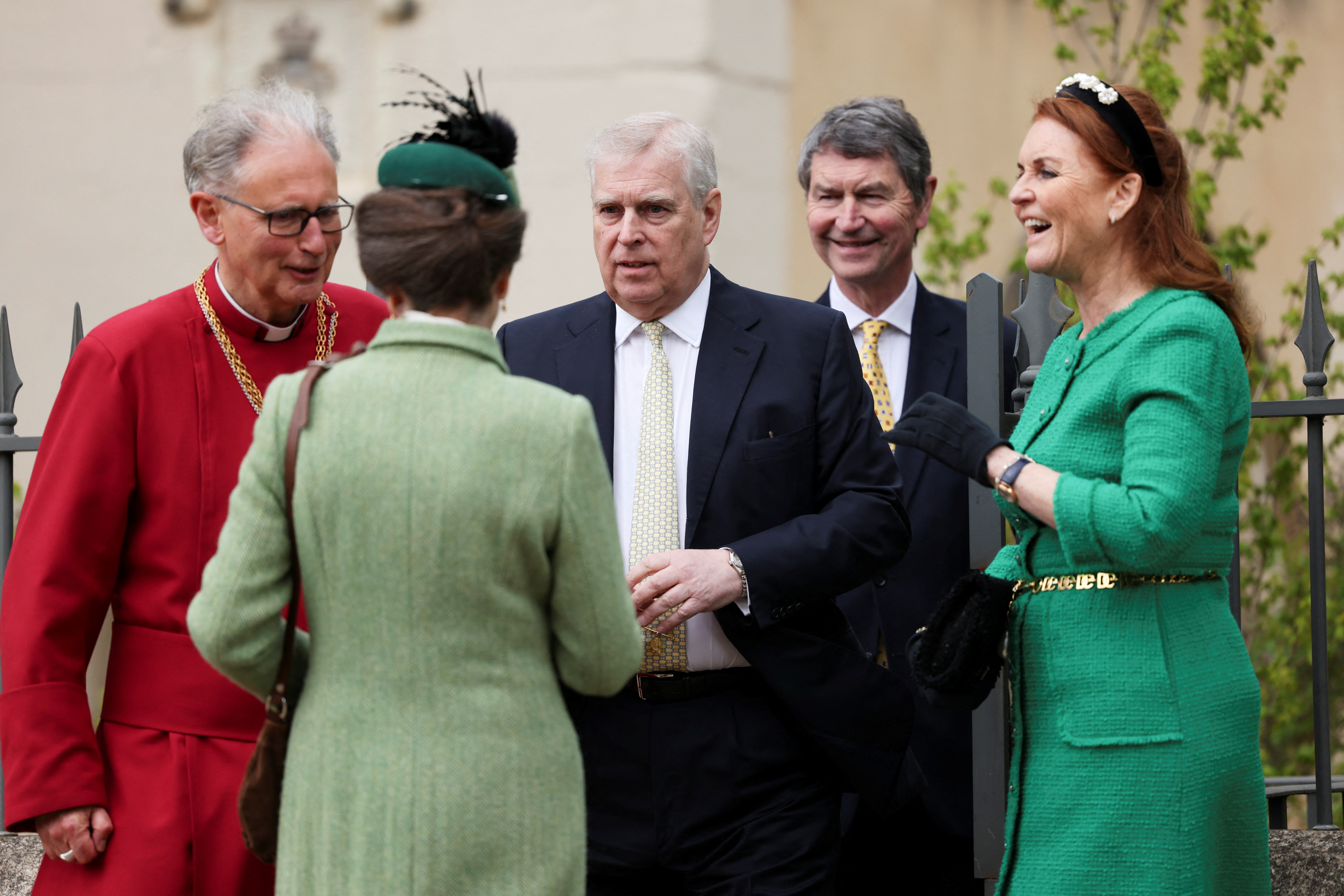 Sarah Ferguson and Prince Andrew talking to Princess Anne outside church