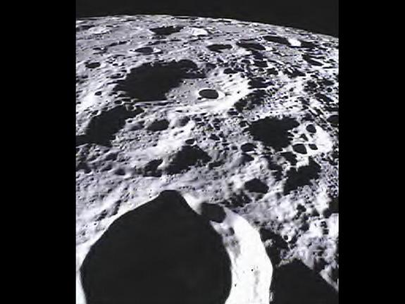 This image of the lunar surface was taken by the MoonKAM system onboard the Ebb spacecraft on March 15, 2012. The 42.3-mile-wide (68-kilometer-wide) crater in the middle of the image (with the smaller crater inside) is Poinsot. Crater Poinsot, named for the French mathematician Louis Poinsot, is located on the northern part of the moon's far side.