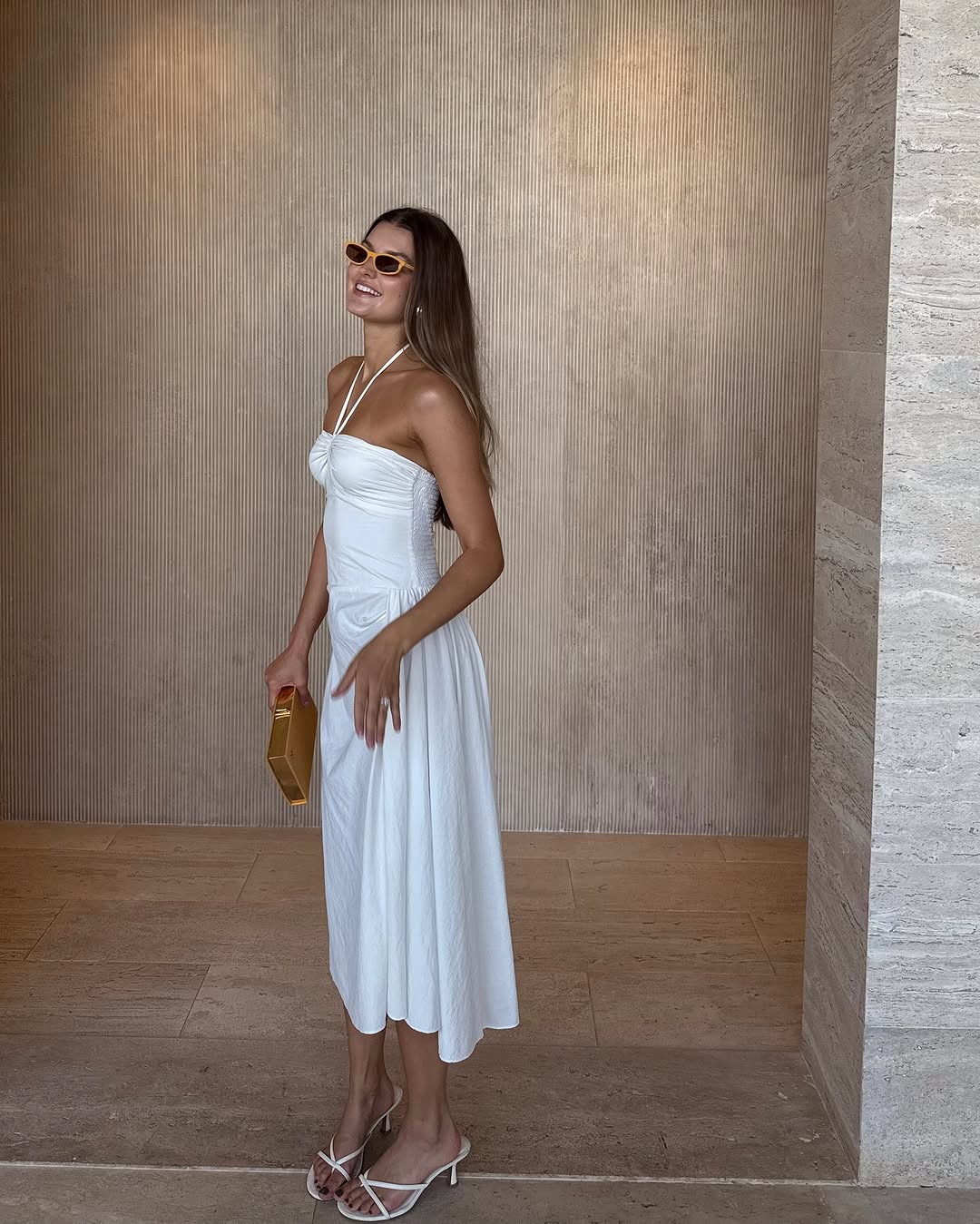 woman wearing white midi dress and white kitten heels