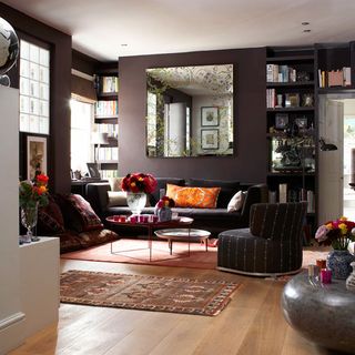living room with wooden floor and sofa