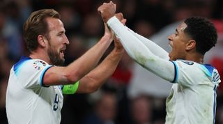 LONDON, ENGLAND - OCTOBER 17: Harry Kane celebrates with Jude Bellingham of England after scoring the team's third goal during the UEFA EURO 2024 European qualifier match between England and Italy at Wembley Stadium on October 17, 2023 in London, England. (Photo by Eddie Keogh - The FA/The FA via Getty Images)
