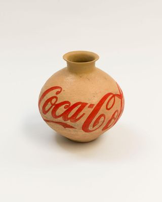 Ai Weiwei one of the key ceramic artists of the 21st century, Coca Cola Vase, 2011. Han Dynasty vases (206BC-220AD), a ceramic piece featured in our exploration of the most pioneering ceramic artists
