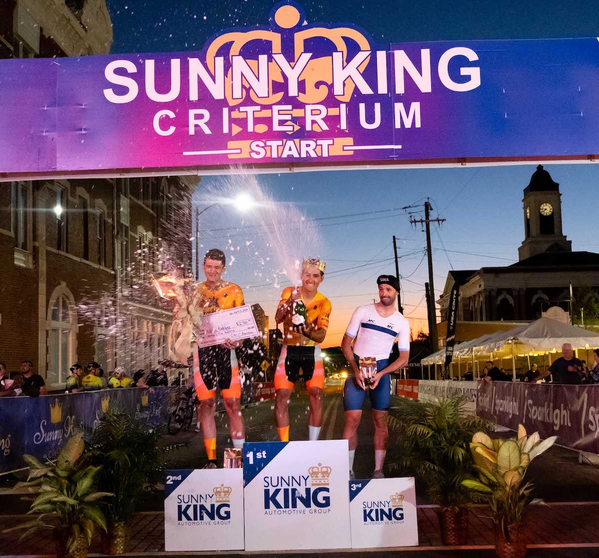 Sunny King Criterium men&rsquo;s podium: second place Bryan Gomez (Reign Storm Racing, winner Alfredo Rodriguez (Reign Storm Racing) and third place Roderyck Asconeguy Diaz (MC Cycling Team)