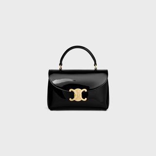 Celine Teen Nino Bag with a top handle and a gold logo