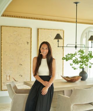 joanna gaines in dining room with gold ceiling