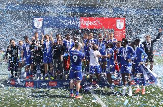 Leicester City players celebrate after winning promotion back to the Premier League in May 2024.