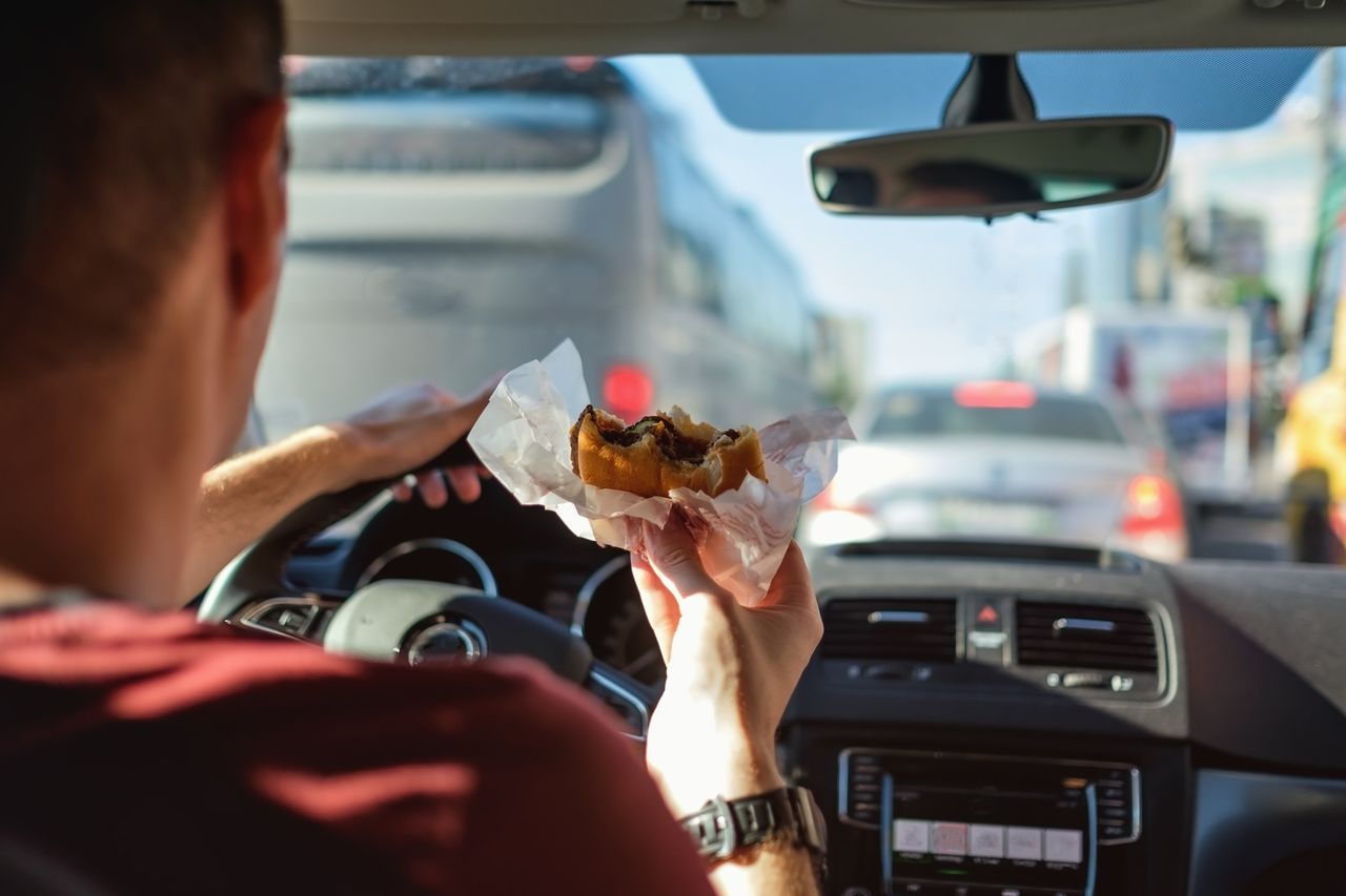 Driving and eating.