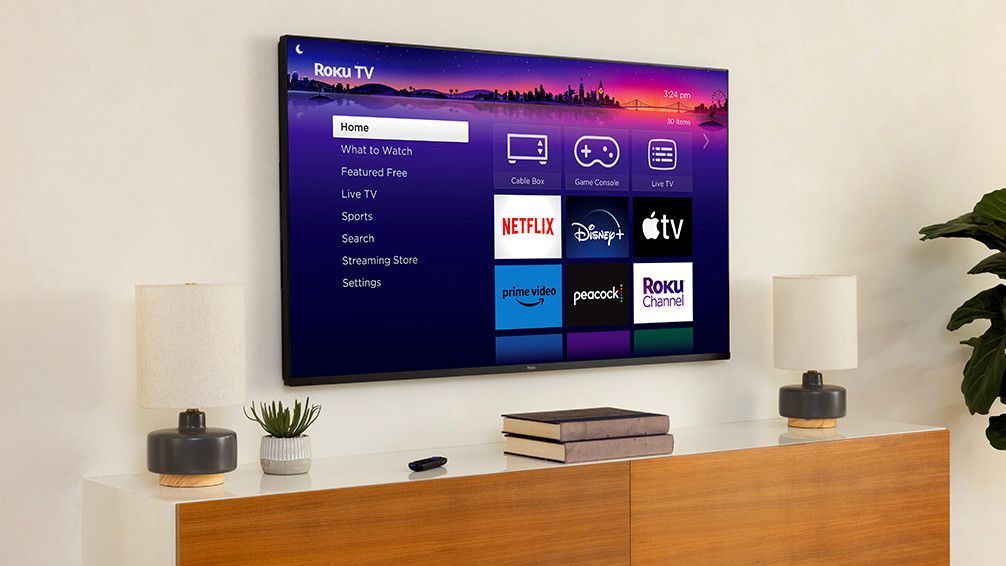 The Roku Pro Series TV hanging on a wall.