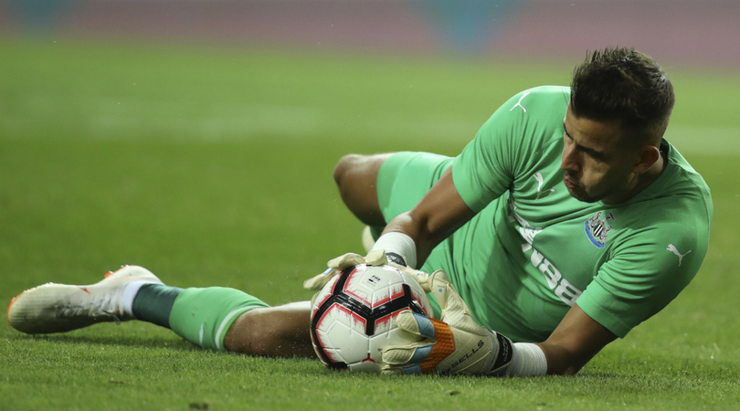 Martin Dubravka makes a save while playing for Newcastle