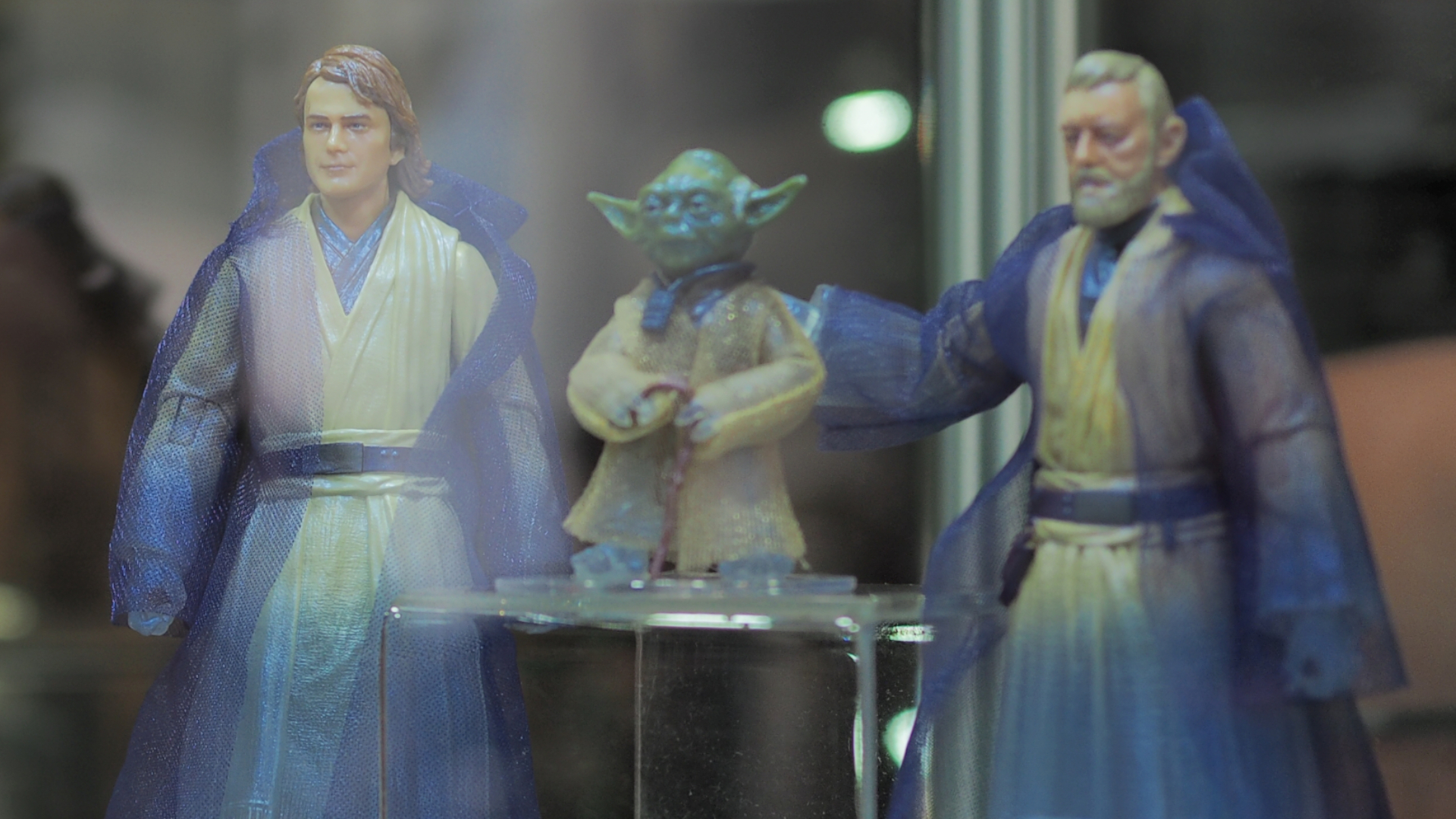 Force Ghost action figures of Anakin, Yoda, and Obi-Wan look on