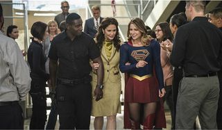 The president with j'onn and supergirl on supergirl