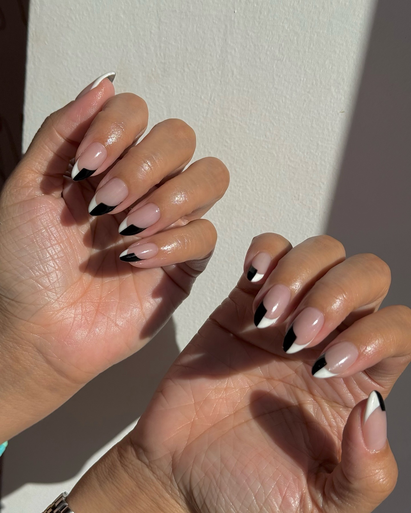@nailartbyqueenie photo of nails in tuxedo