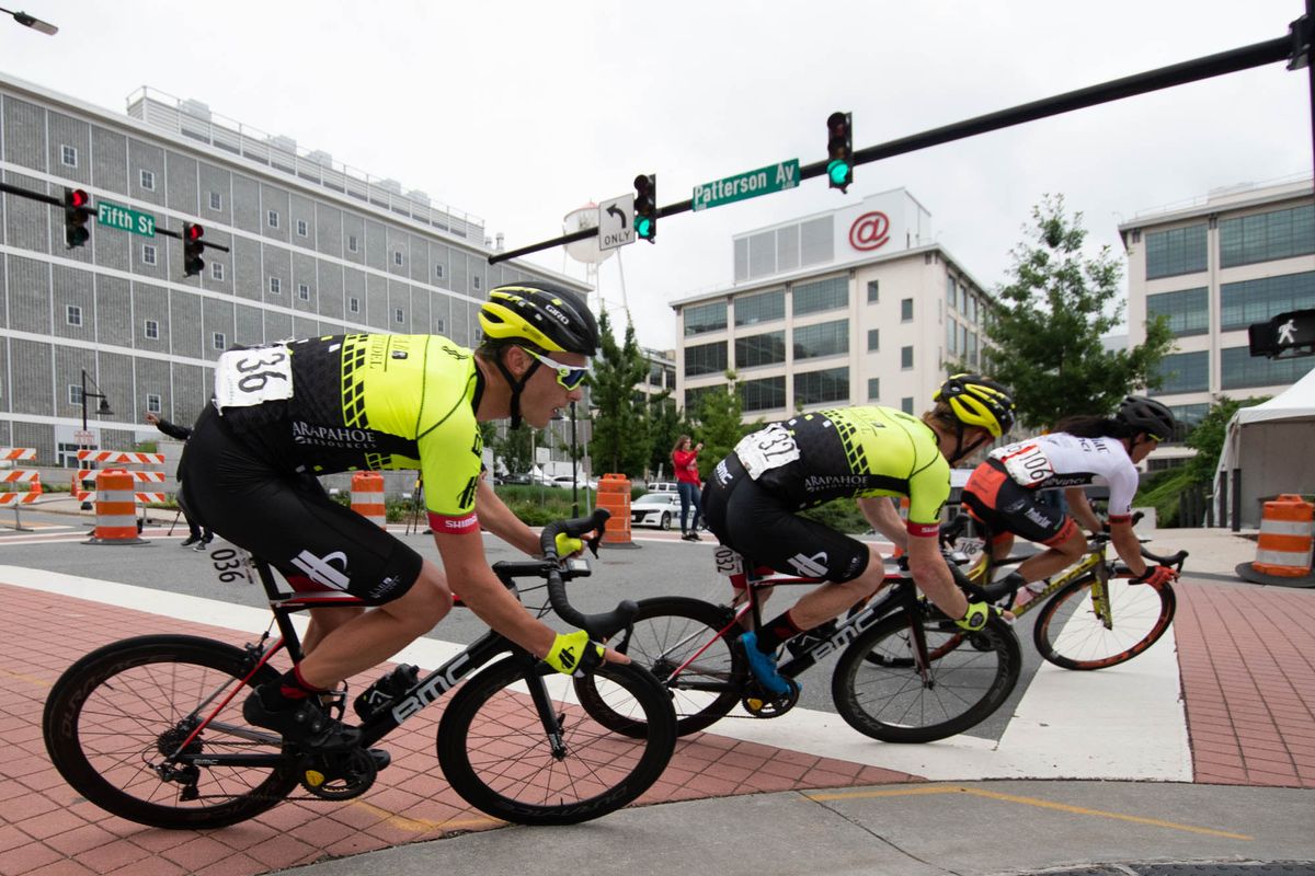 Riders take one of the slippery corners during the road race at the Winston-Salem Cycling Classic