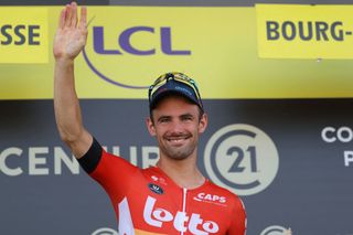 Lotto Dstnys Belgian rider Victor Campenaerts celebrates on the podium with the most combative riders award after the 18th stage of the 110th edition of the Tour de France cycling race 184 km between Moutiers and BourgenBresse in the French Alps on July 20 2023 Photo by Thomas SAMSON AFP Photo by THOMAS SAMSONAFP via Getty Images