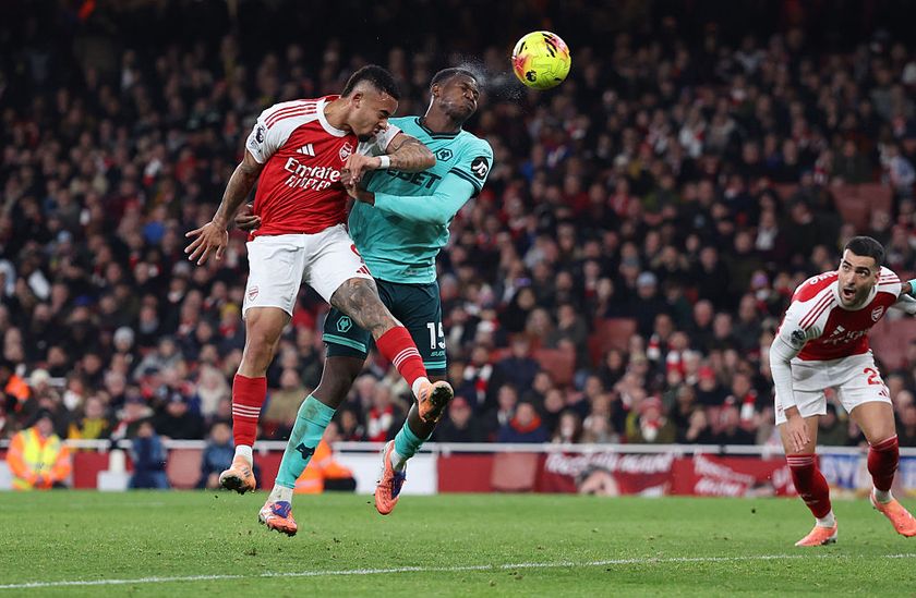 Yerson Mosquera of Wolverhampton Wanderers scores an own goal to make it 2-1 during the Premier League match between Arsenal and Wolverhampton Wanderers at Emirates Stadium on December 13, 2025 in London, England.