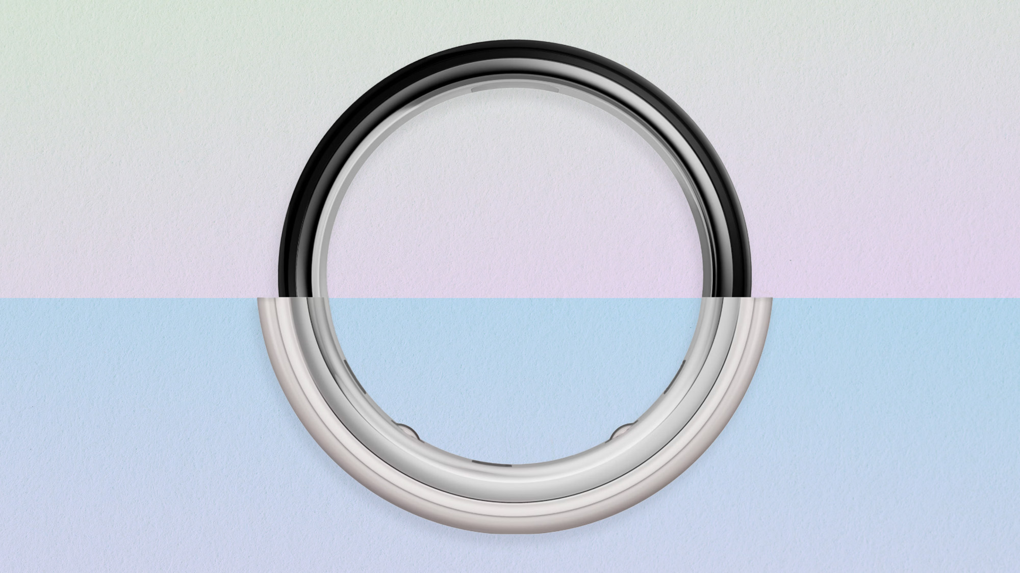 Oura Ring 5 on top and Oura Ring 4 below, cut in half to show the difference in design