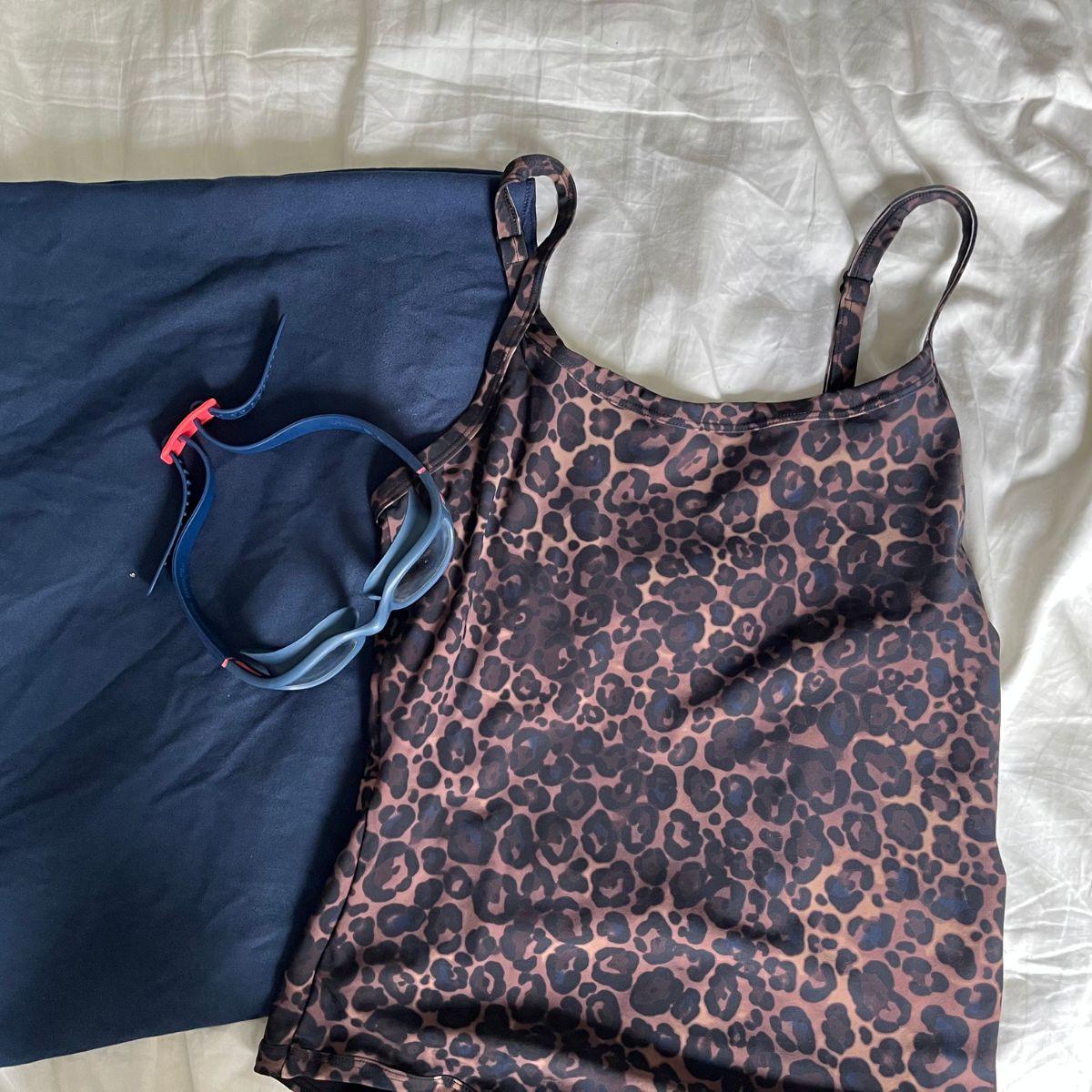 Amelia's swimming kit: towel, goggles, swimming costume
