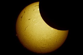 Hydrogen-alpha filter view of solar eclipses.