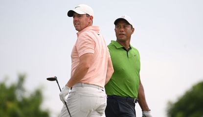 Tiger and Rory stare in the distance