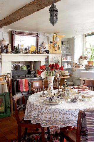 Georgian kitchen with stove and laid table