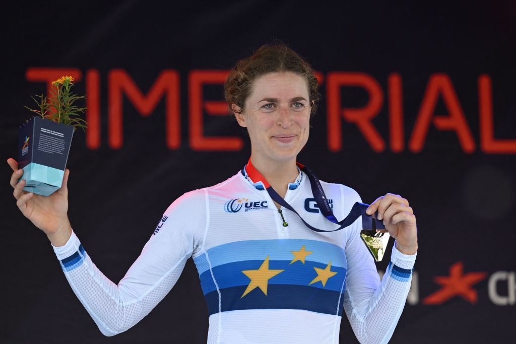 Switzerlands Marlen Reusser celebrates on the podium after winning the Womens Individual time trial during the European Championships Munich 2022 in Munich southern Germany on August 17 2022 Photo by CHRISTOF STACHE AFP Photo by CHRISTOF STACHEAFP via Getty Images